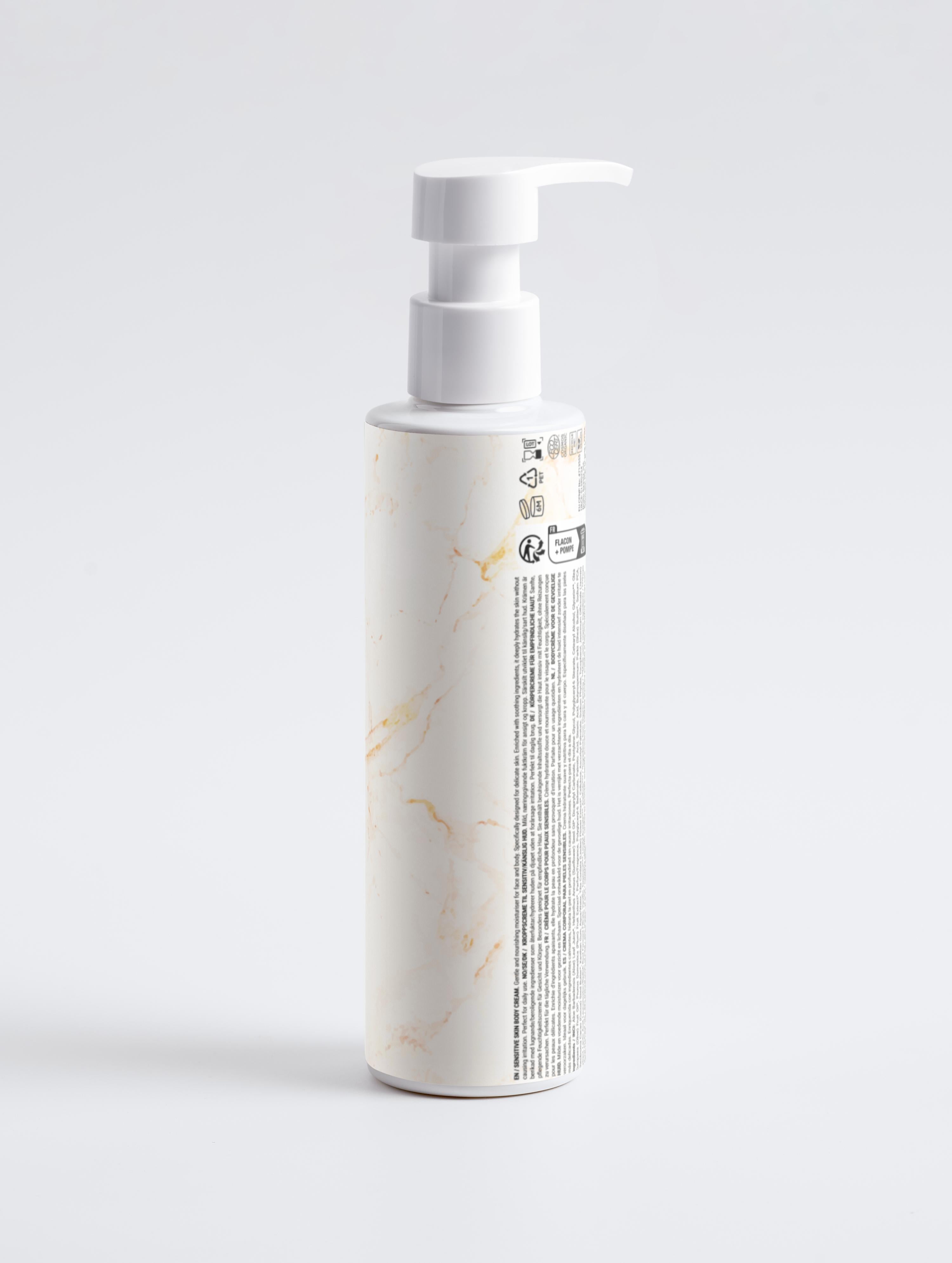 Eclat Soin Body Serum in a sleek pump bottle, ideal body cream for dehydrated & sensitive skin